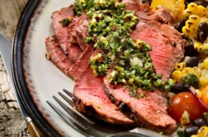 GrilledSteakChimichurriSauce 642637618 770x553 1 650x428