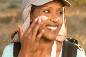 hiker applies sunscreen 514727309 770x533 1 650x428