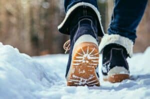 person walking winter snow boots 1193959625 770x533 1 650x428