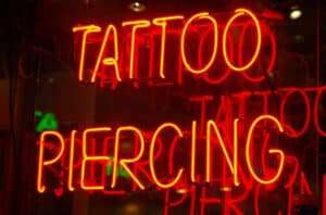 tattoo Piercing Sign 144348060 770x533 1 650x428
