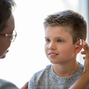 young boy ears checked istock 477562350